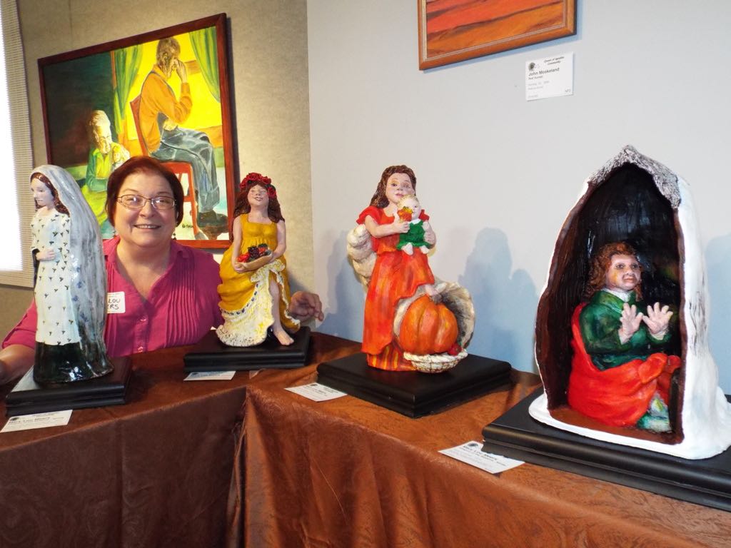 Mary Lou with Four Seasons Sculptures in Gallery St John